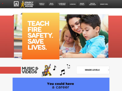 A website screenshot displaying the Sparky School House homepage. The top section has an image of children learning safety with a teacher, and text reads "Teach Fire Safety. Save Lives." Below are links for music, videos, and grade levels, with a banner about careers.