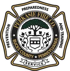Emblem of Perkasie Fire Co in Bucks County, Pennsylvania, featuring a tree, a shield, and the words "Preparedness, Prevention, and Training for Service" on a black, white, and gold maltese cross background.