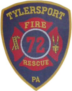 A badge-shaped patch with "Tylersport Fire Rescue PA" in yellow text, a red Maltese cross, the number 72 in the center, and firefighting symbols on each side.